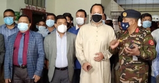 চট্টগ্রামে প্রথম টিকা নিলেন শিক্ষা উপমন্ত্রী নওফেল