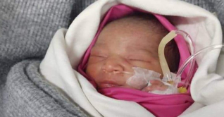 ডাস্টবিনে পড়েছিল নবজাতক