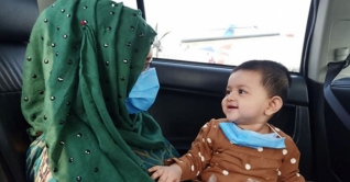 পাঁচ বছরের নীচের বাচ্চাদের মাস্ক নয়: বিশ্ব স্বাস্থ্য সংস্থা