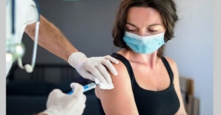 প্রাপ্তবয়স্কদের জন্য বুস্টার ডোজ অনুমোদন যুক্তরাষ্ট্রের