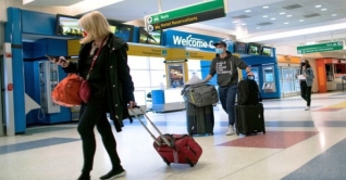 নভেম্বরে থেকে বিদেশিদের ভ্রমণ নিষেধাজ্ঞা শিথিল করছে যুক্তরাষ্ট্র