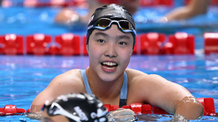 বিশ্বসাঁতার চ্যাম্পিয়নশিপে সর্বকনিষ্ঠ পদকজয়ী চীনা সাঁতারু যু জিদি। ছবি: এএফপি